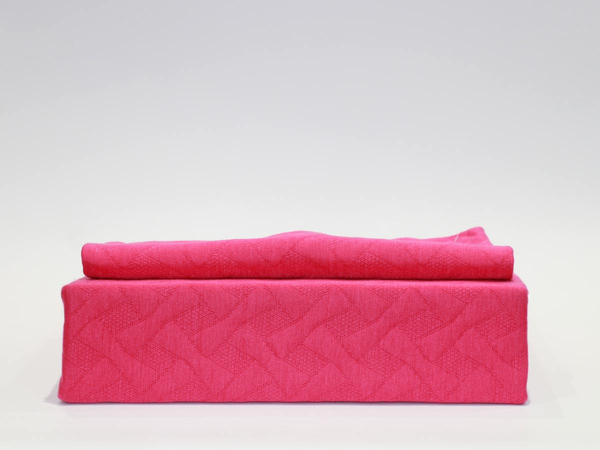 geometric design bed spread fushia