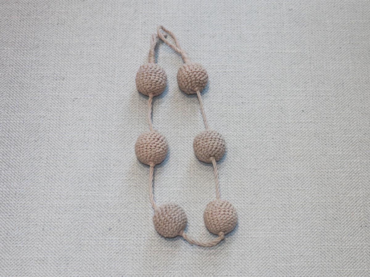 crochet grey balls curtain tie