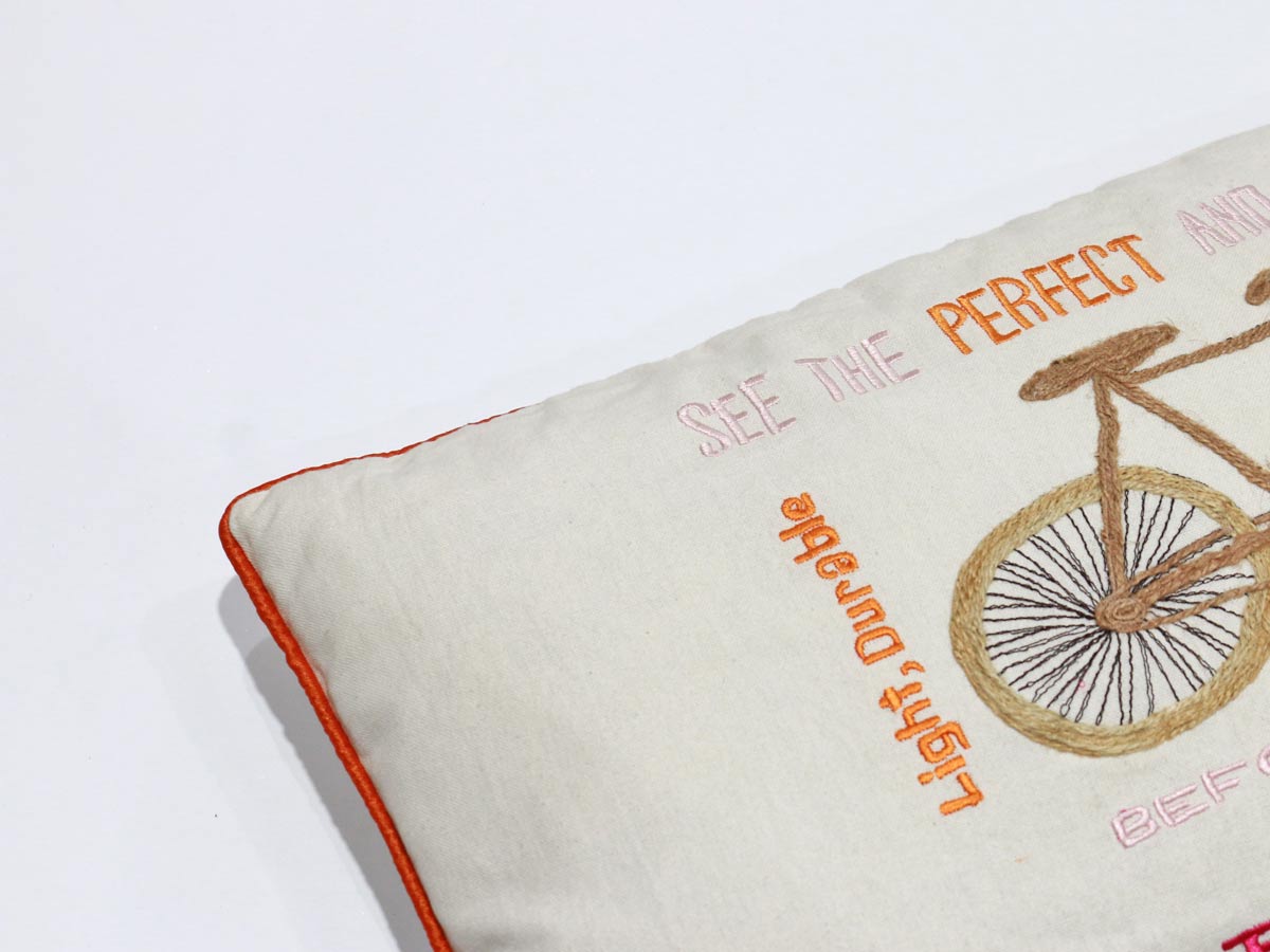 bycicle design cushion with orange border 30x50 cm