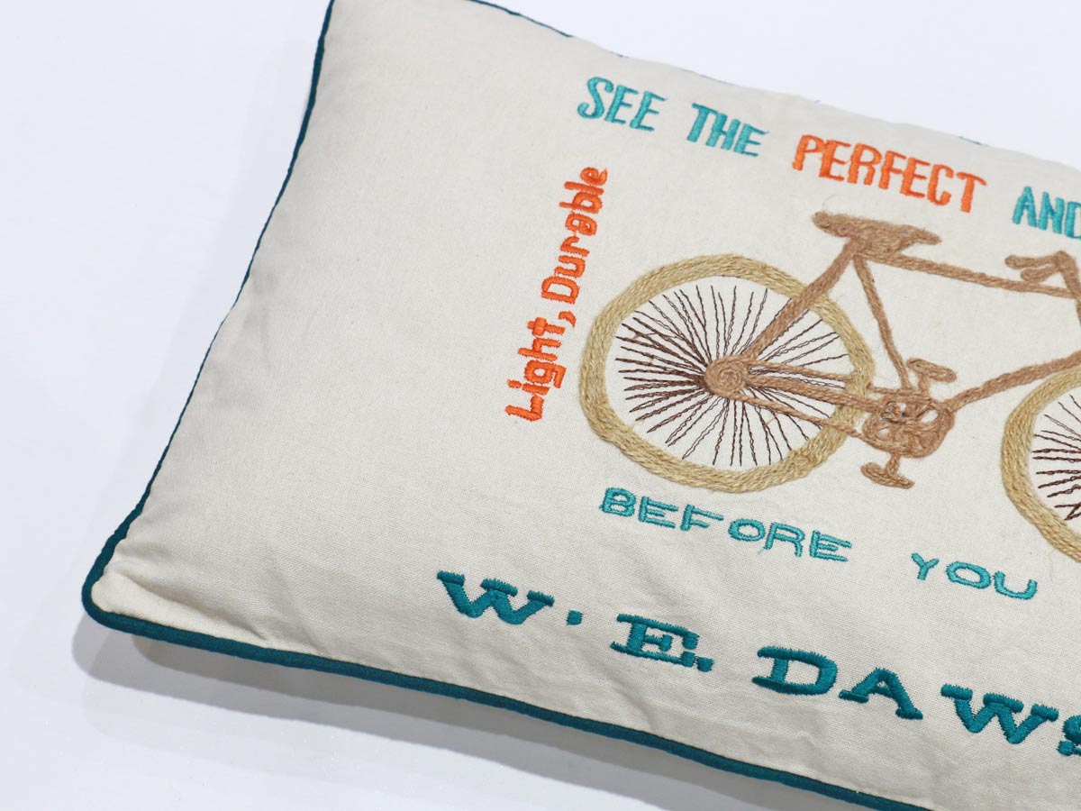 bycicle design cushion with petrol border 30x50 cm