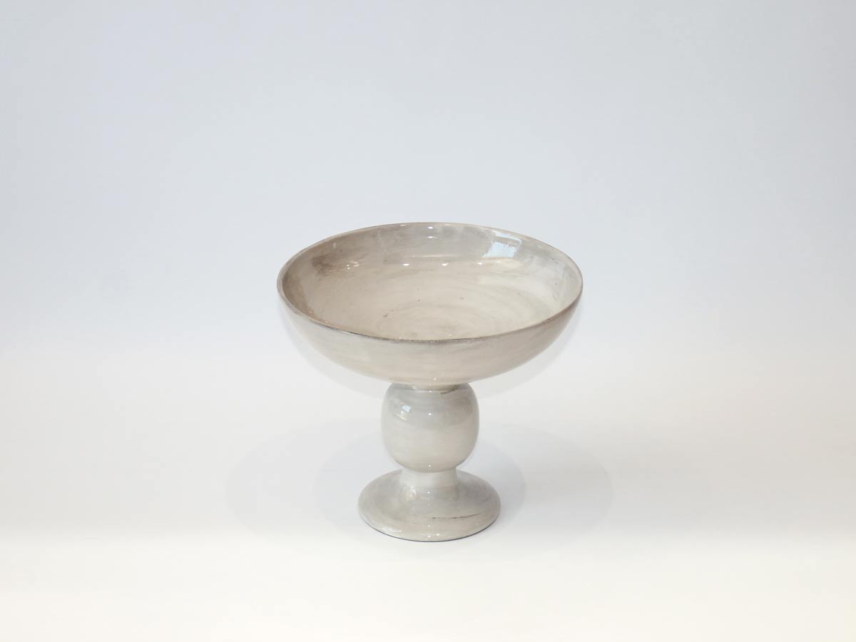 shiny greige wooden sculpted center piece