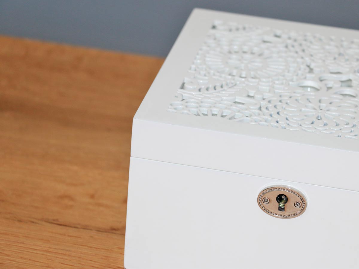 white glossy jewelry box with mirror