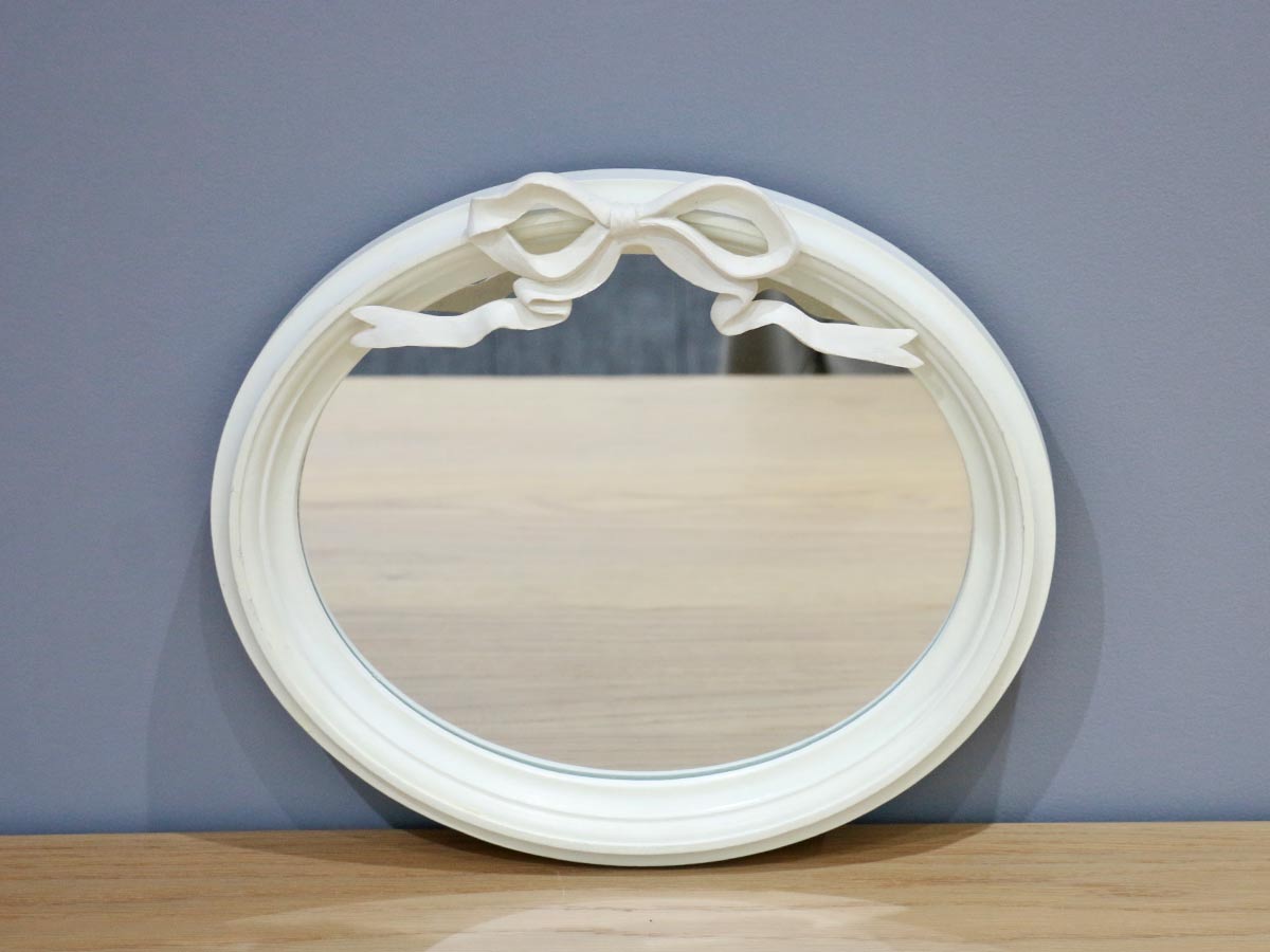 mirror with ribbon detail
