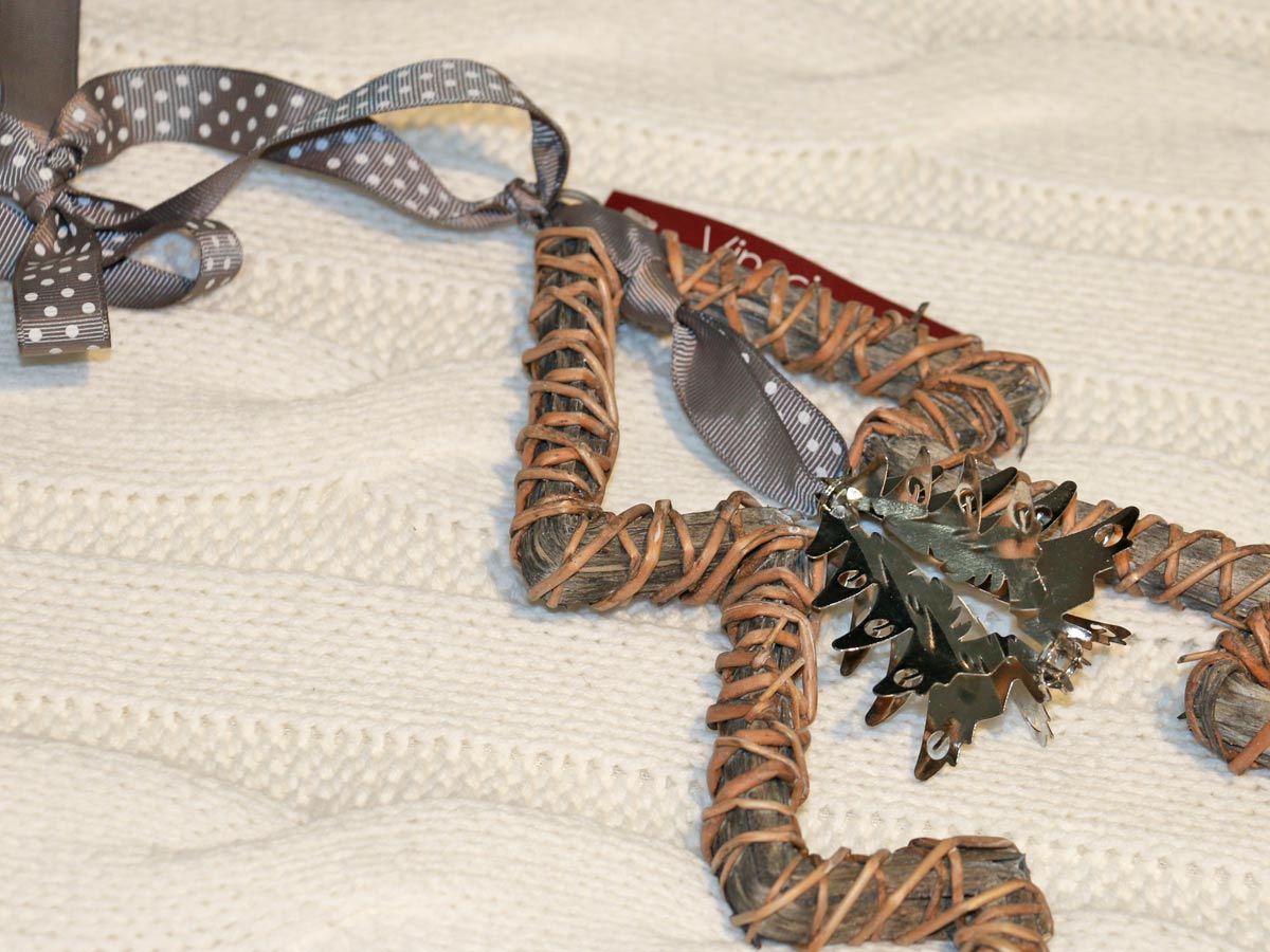 christmas tree with ribbon and iron bell