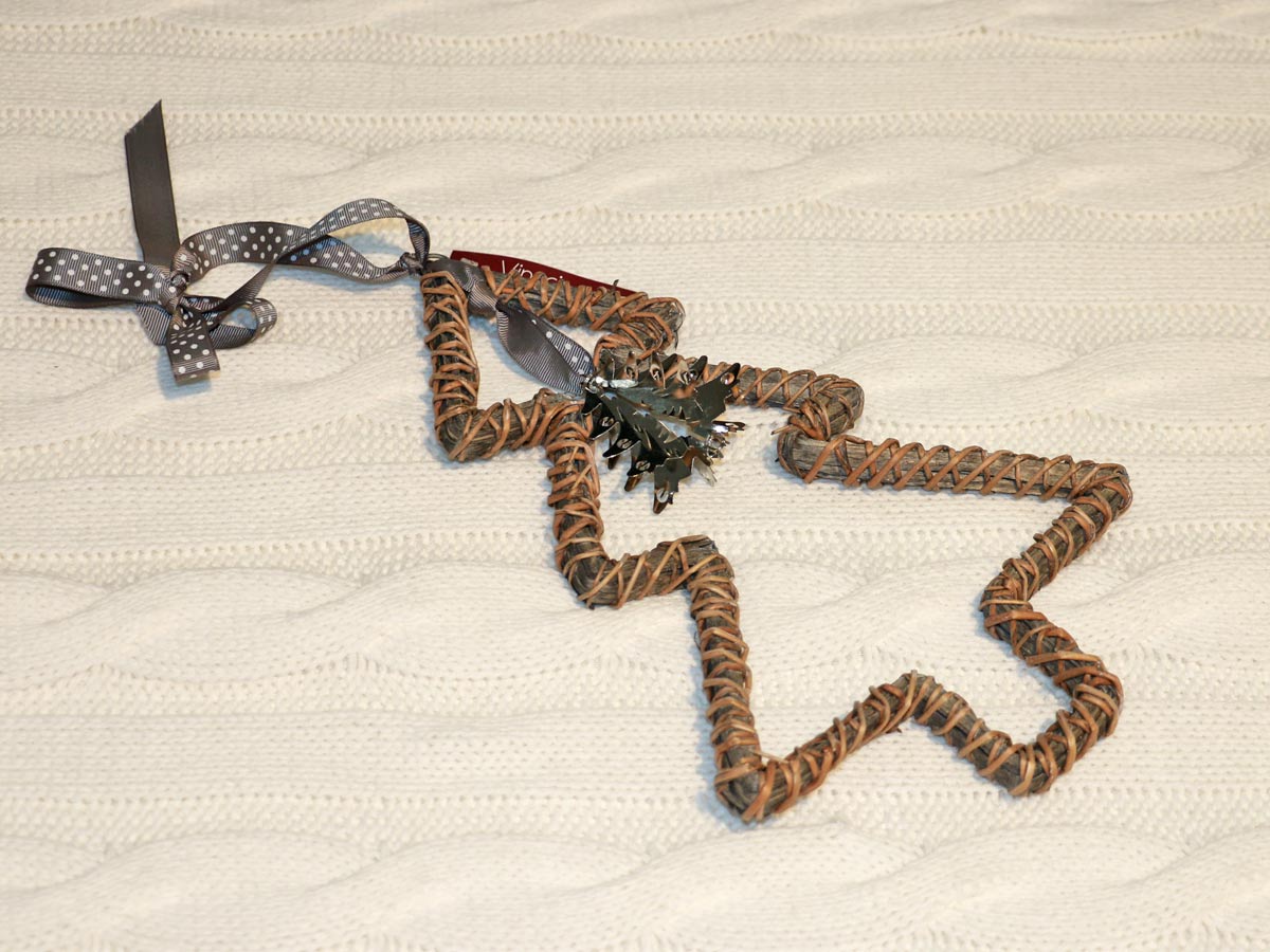 christmas tree with ribbon and iron bell