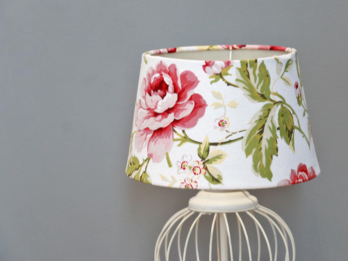 white wired lamp with floral shade