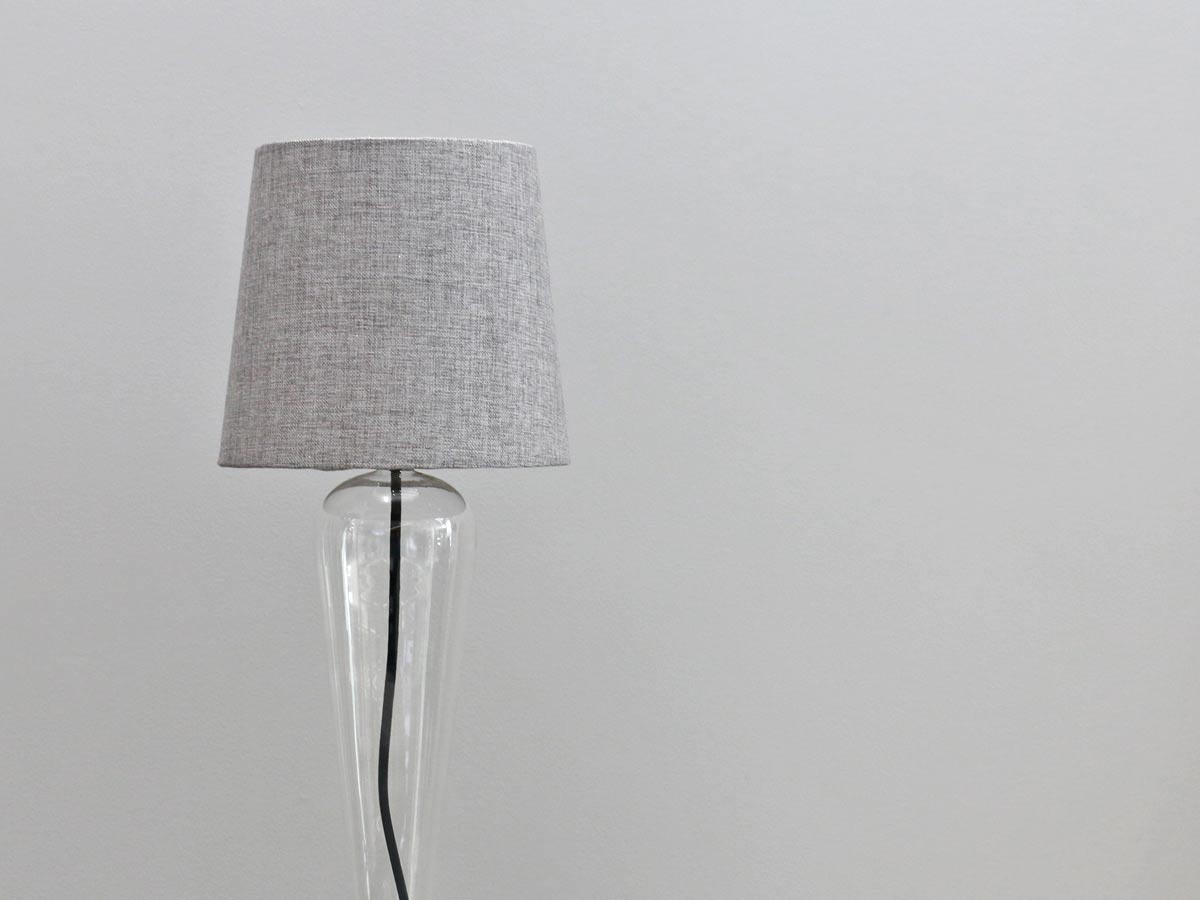 crystal clear glass lamp with white shade