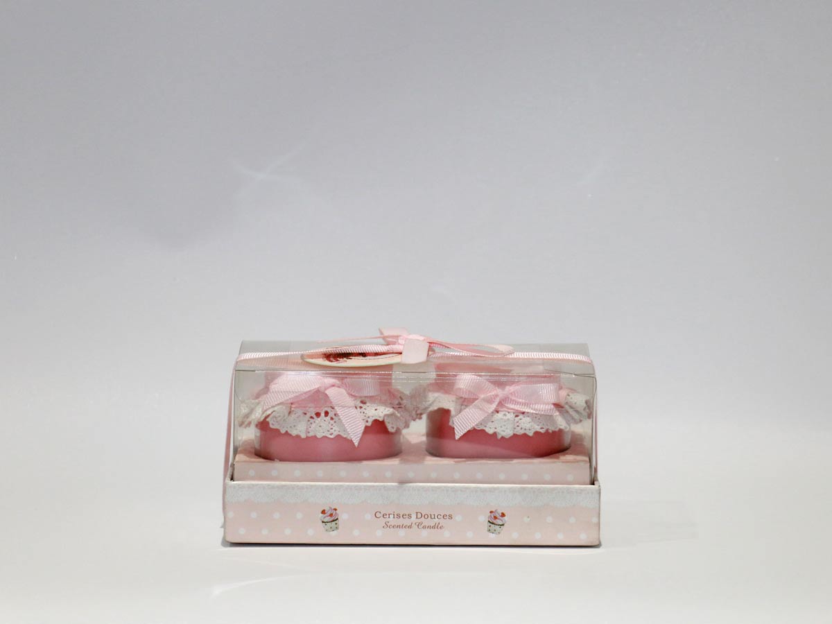 scented pink candles in jars
