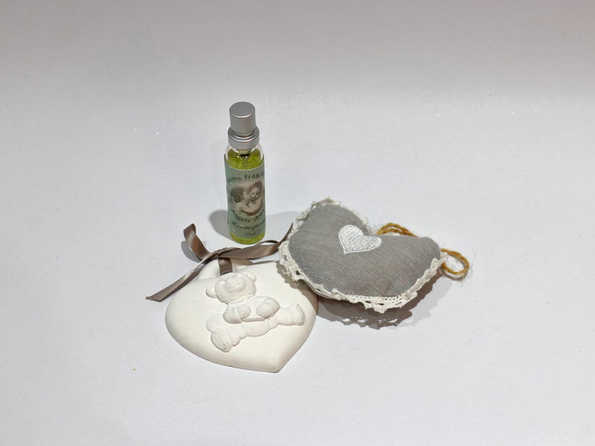 grey set of paded and plaster hearts with refill bottle
