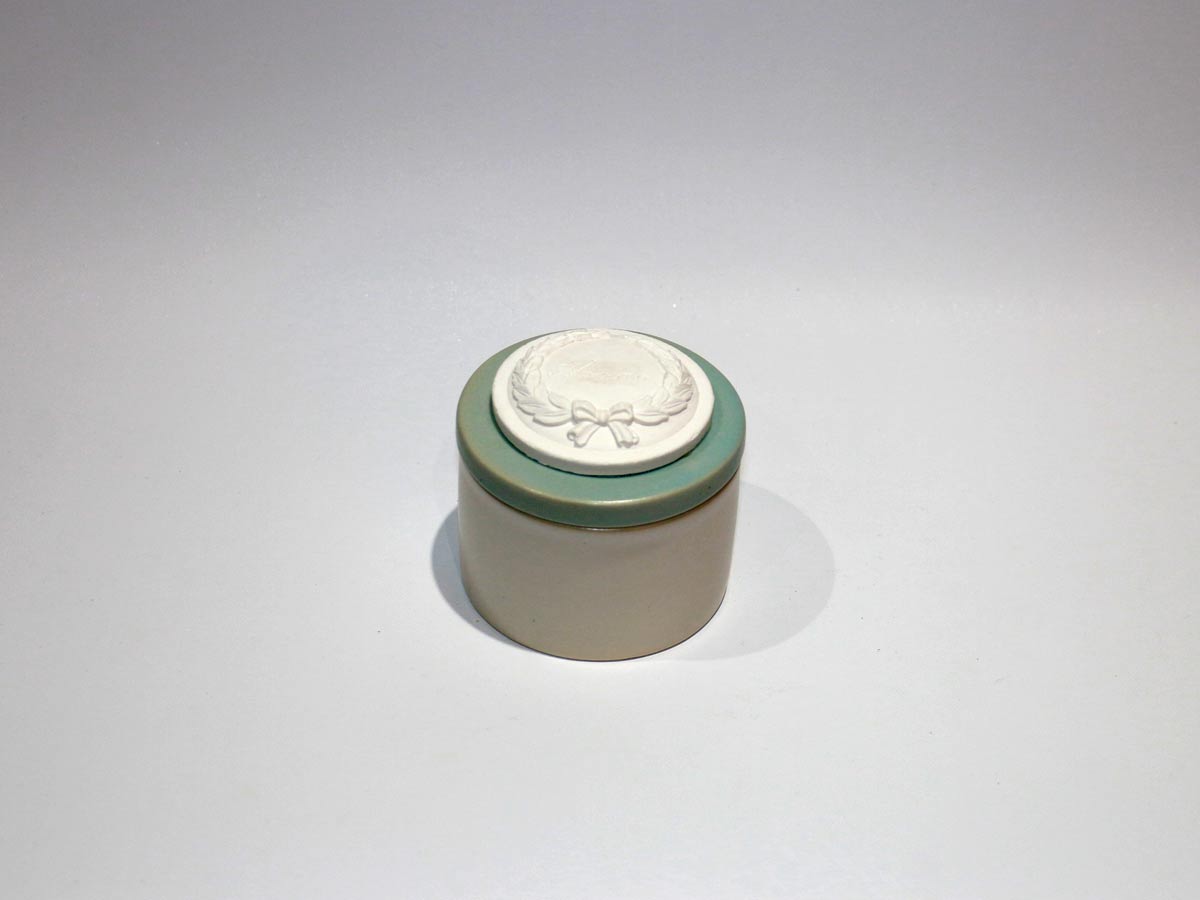 blue scented candle in jar