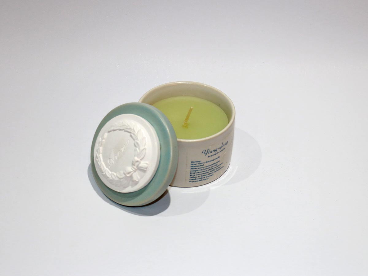 blue scented candle in jar