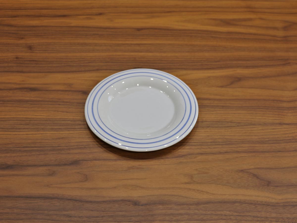 white plate with blue rim 23cm