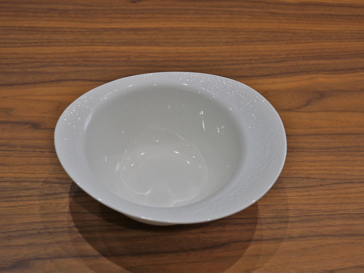 white glossy bowl with raised design 20cm