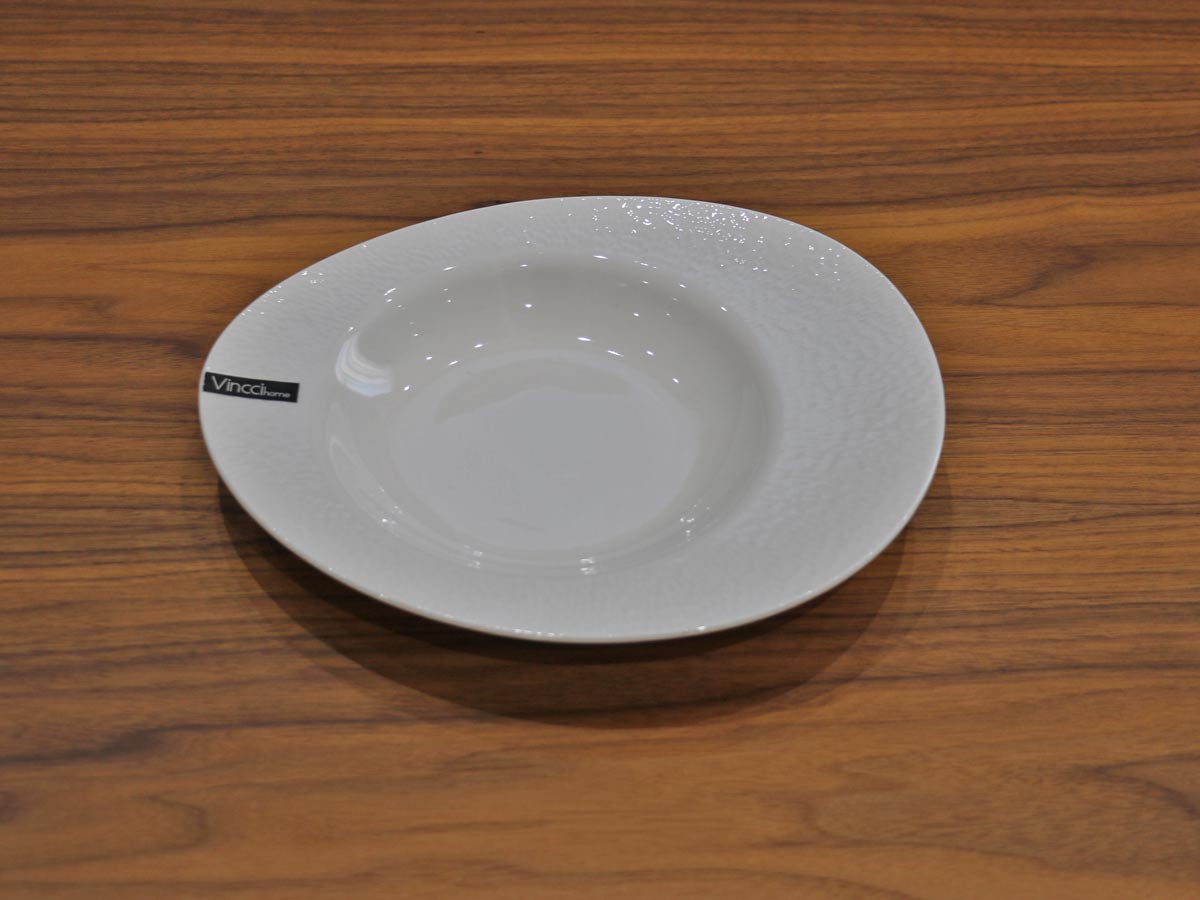 white glossy soup plate with raised design 22cm