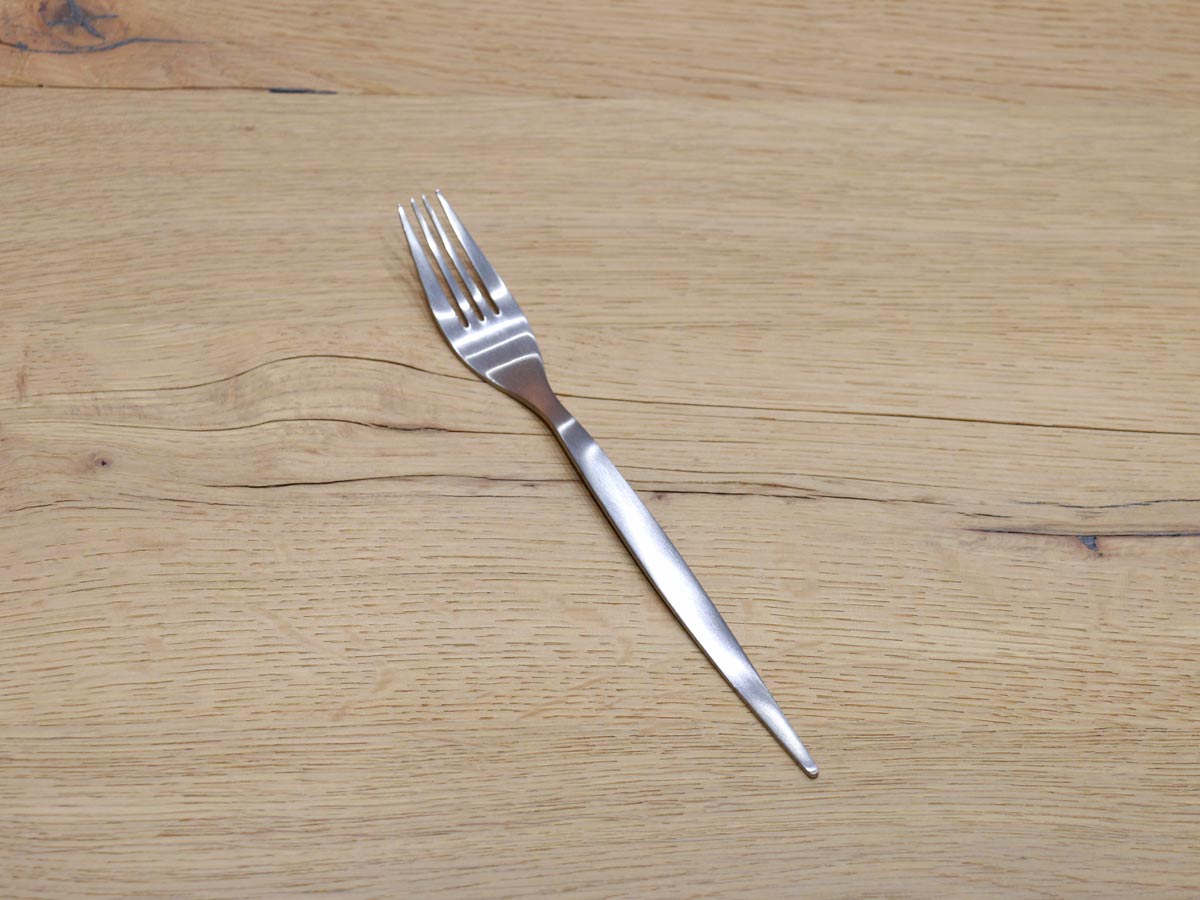matte silver-colored stainless steel table fork