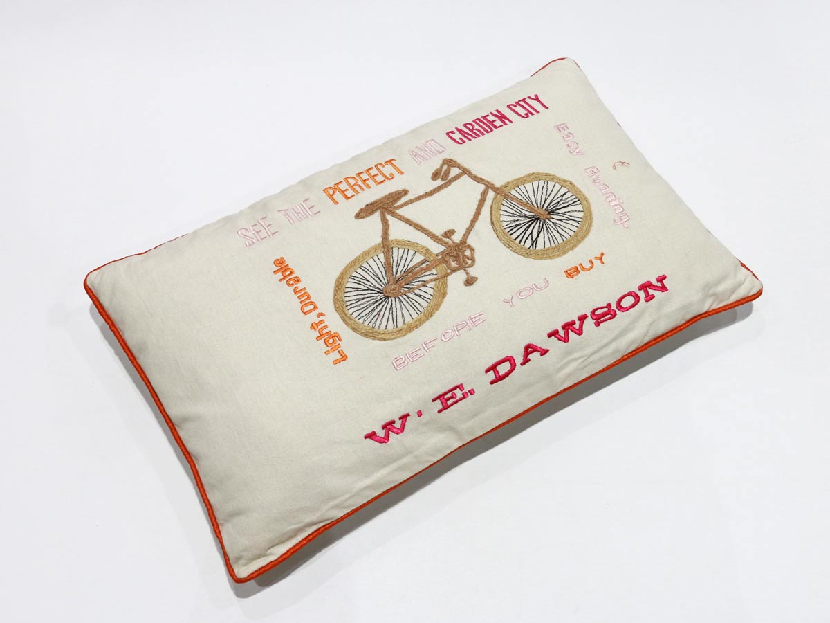 bycicle design cushion with orange border 30x50 cm