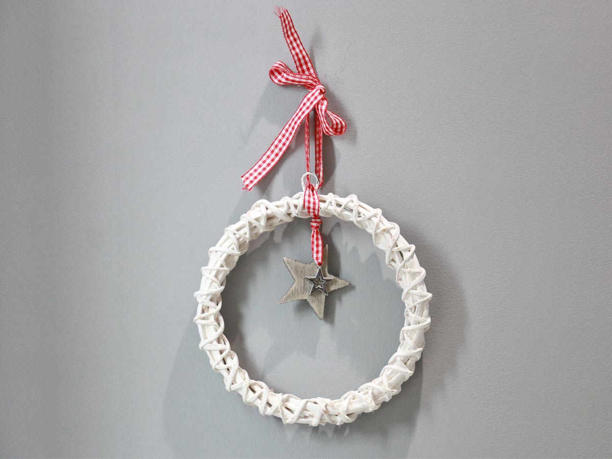 white ring with wooden and silver stars