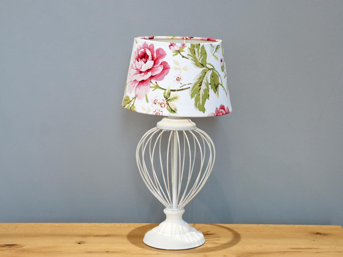 white wired lamp with floral shade