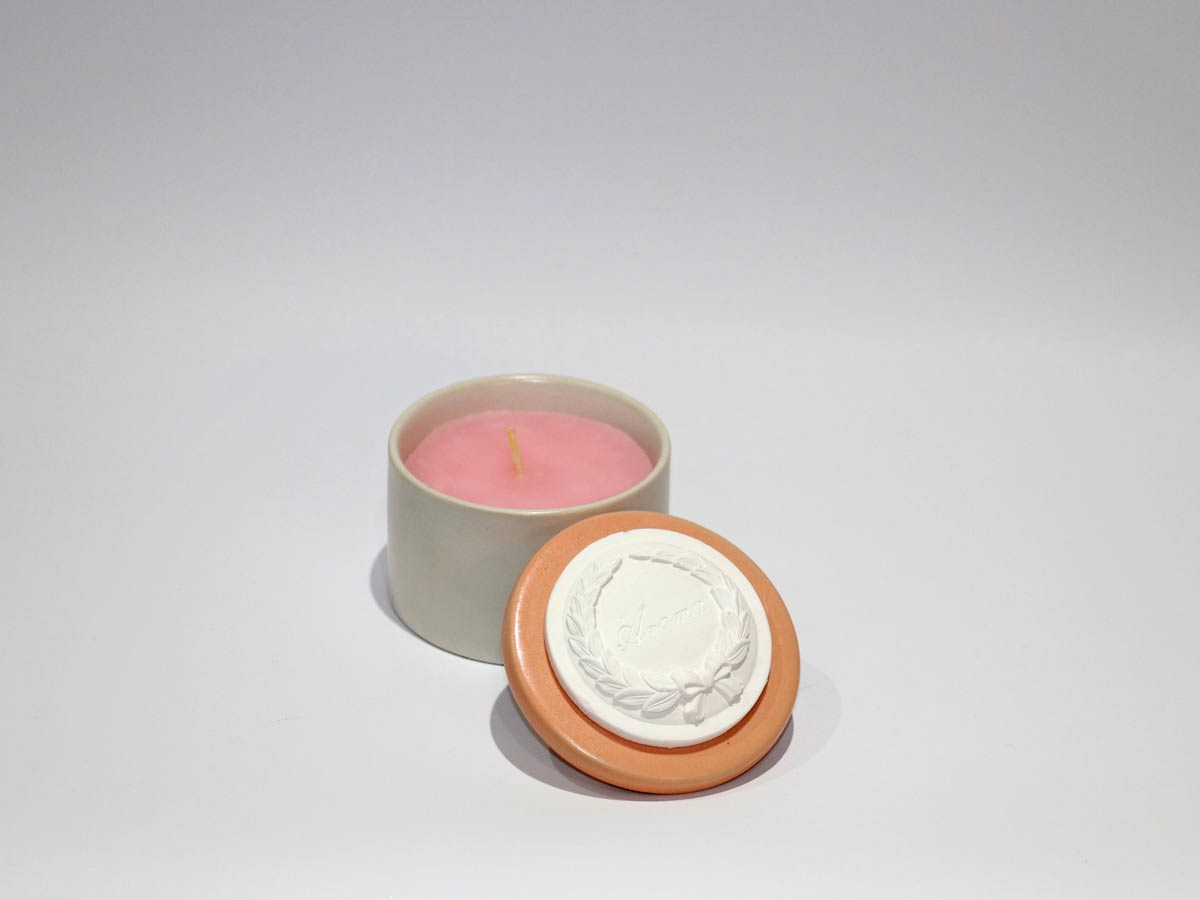 pink scented candle in jar