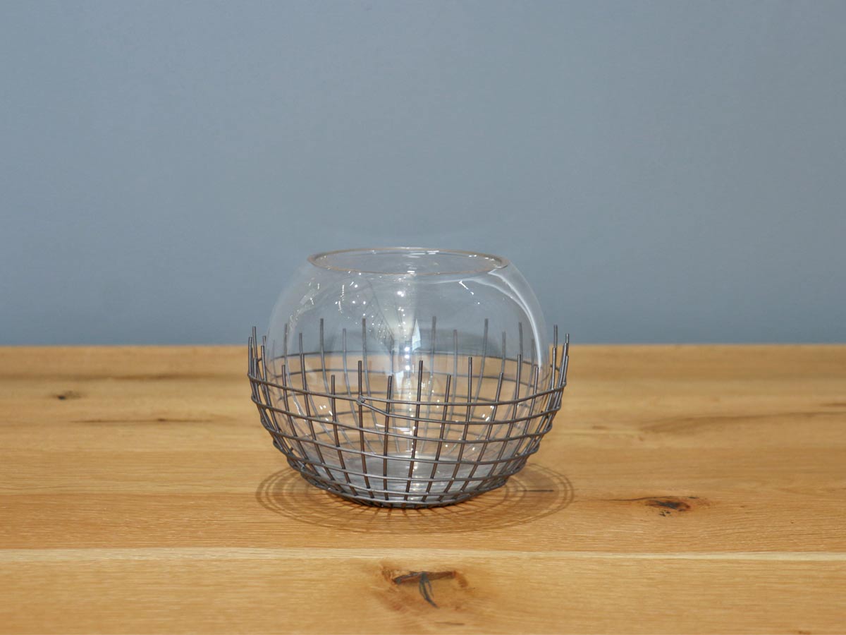 round vase with metal