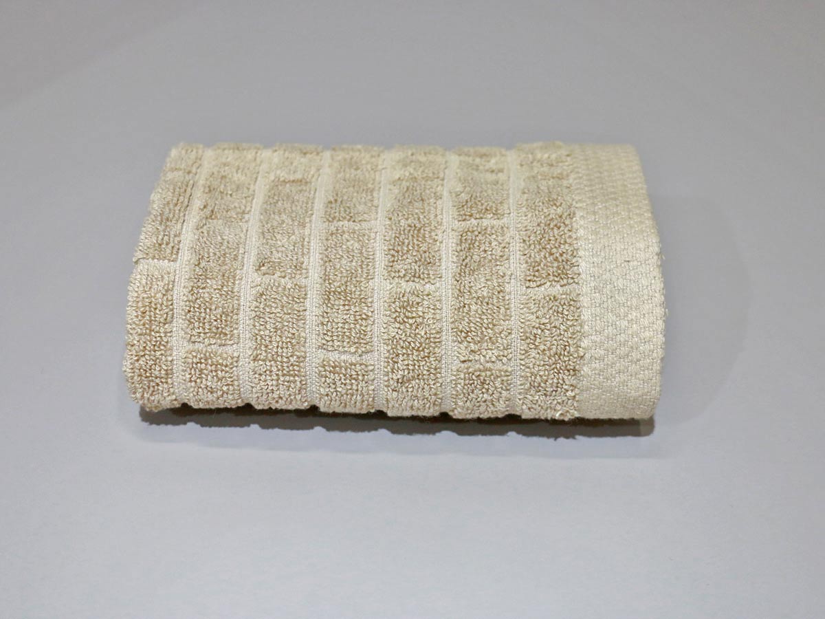textured towel ficelle 33x33cm