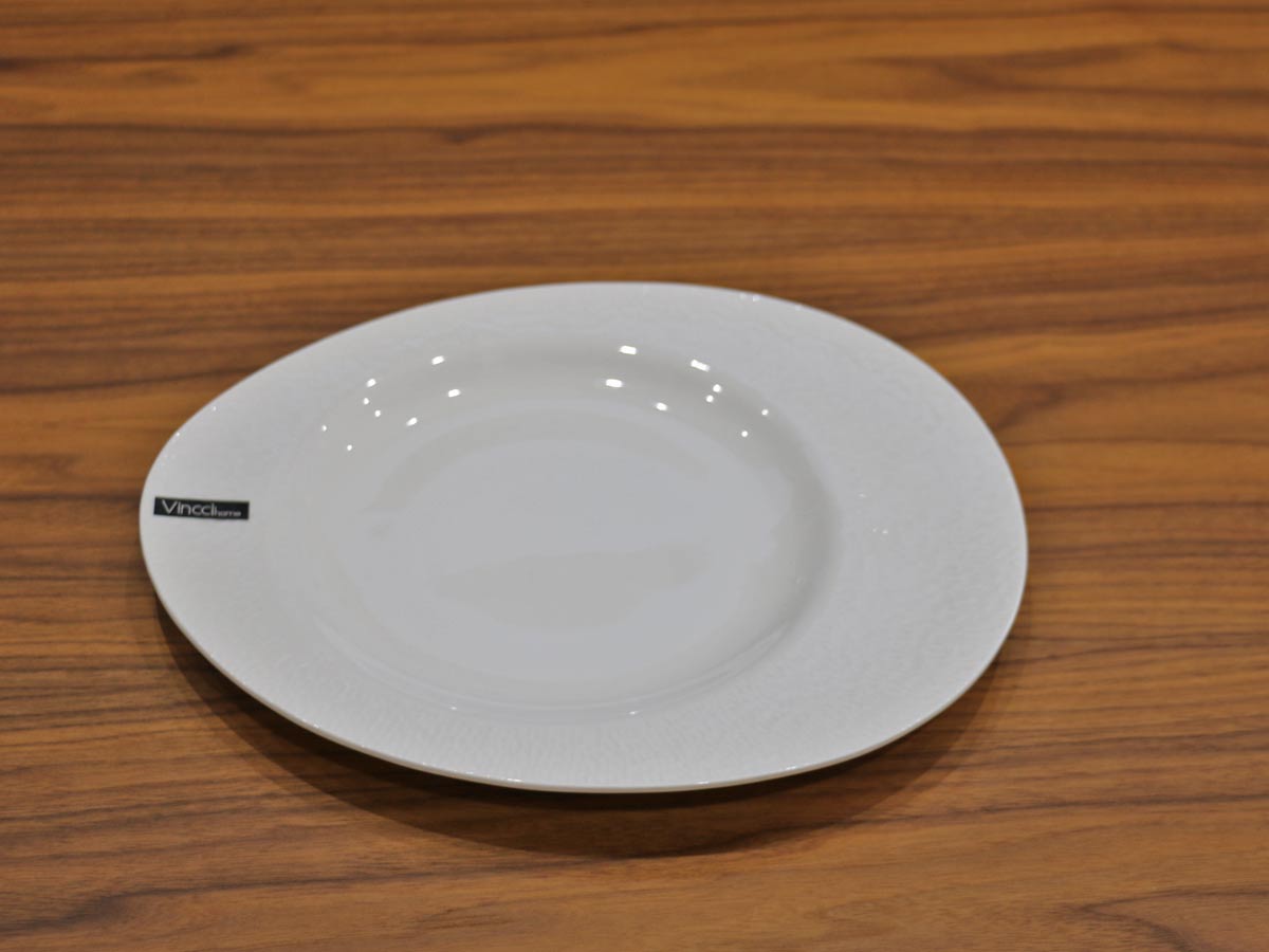 white glossy dinner plate with raised design 27cm