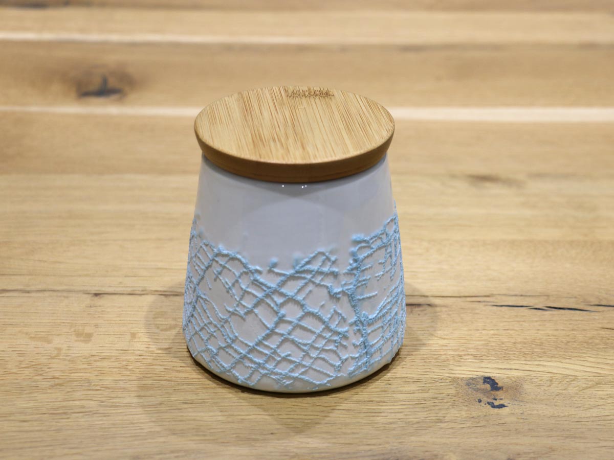 ceramic and wood blue embossed canister 10cm