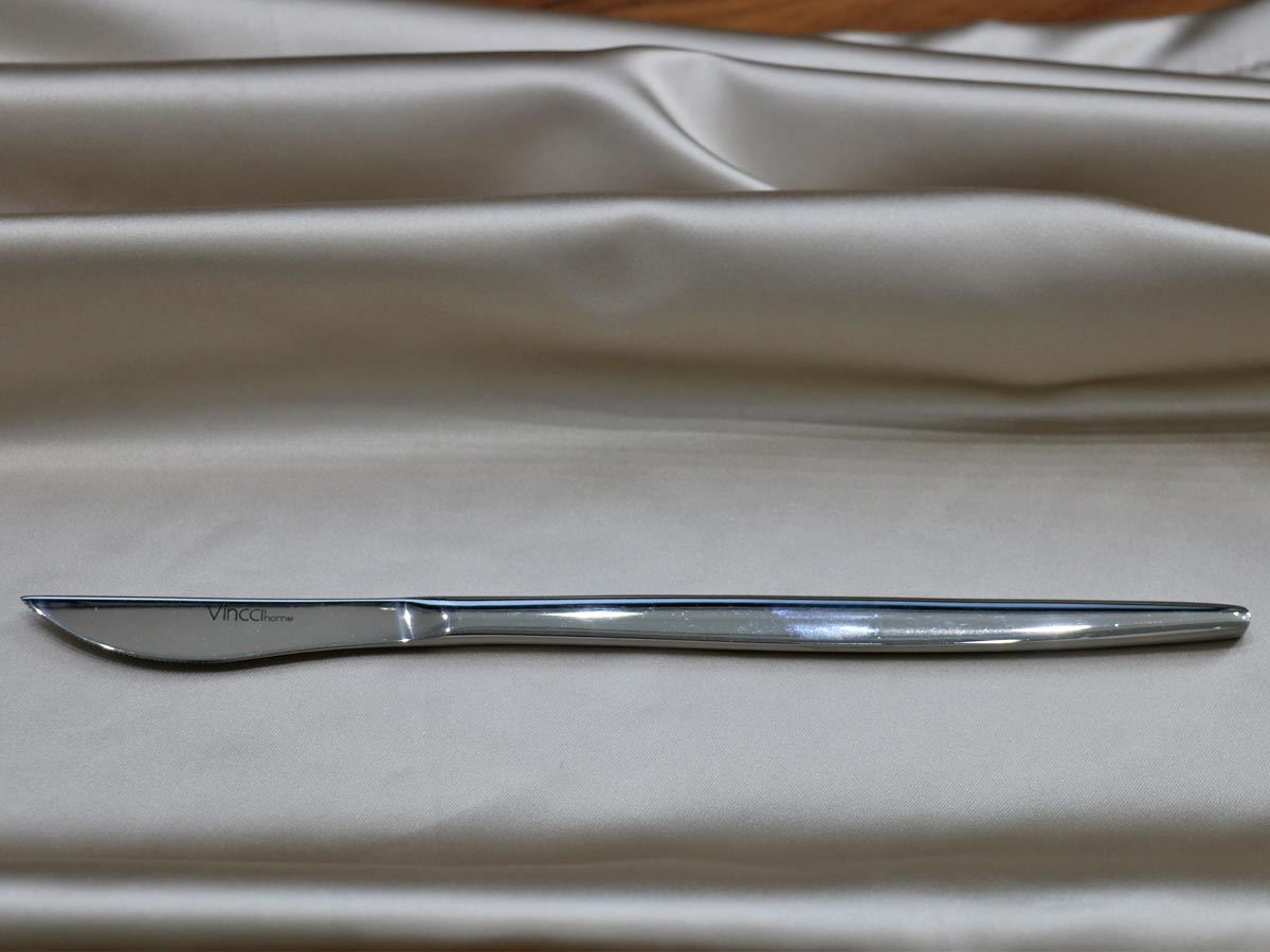 shiny silver-colored stainless steel table knife