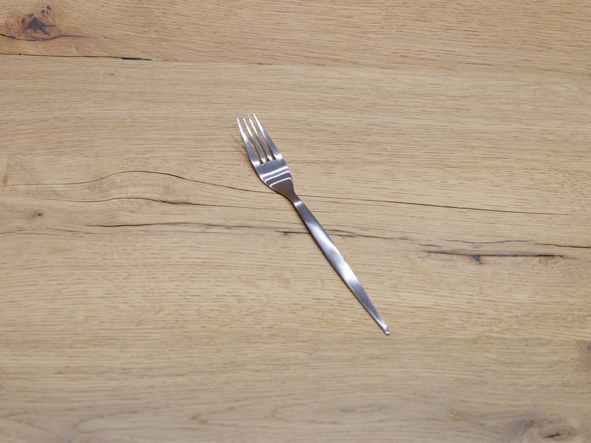 matte silver-colored stainless steel dessert fork