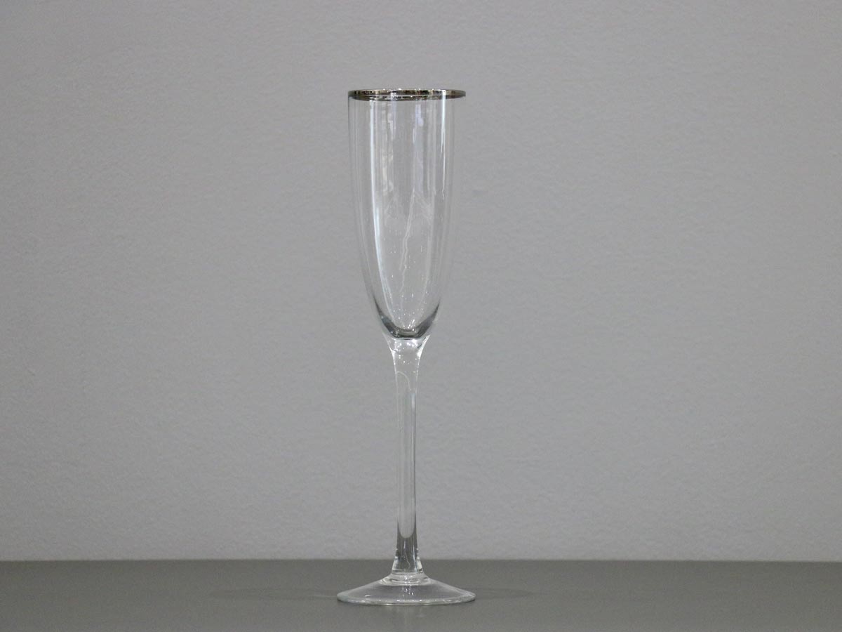 flute glass with silver rim